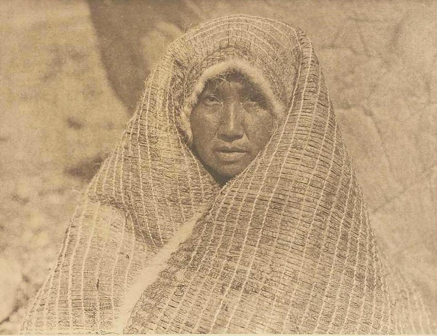 Nootka Woman Wearing Cedar-Bark Blanket by Edward S. Curtis, Originally photographed c.1915