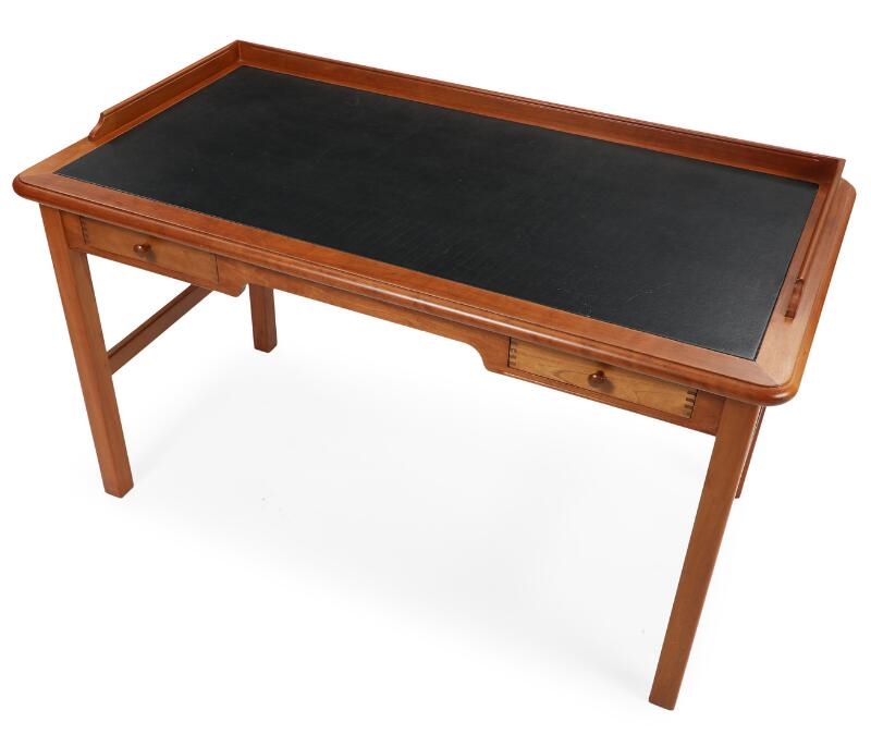 Artwork by Andreas Hansen, A freestanding cherry wood desk, partly covered with black leather, front with two drawers, Made of cherry wood