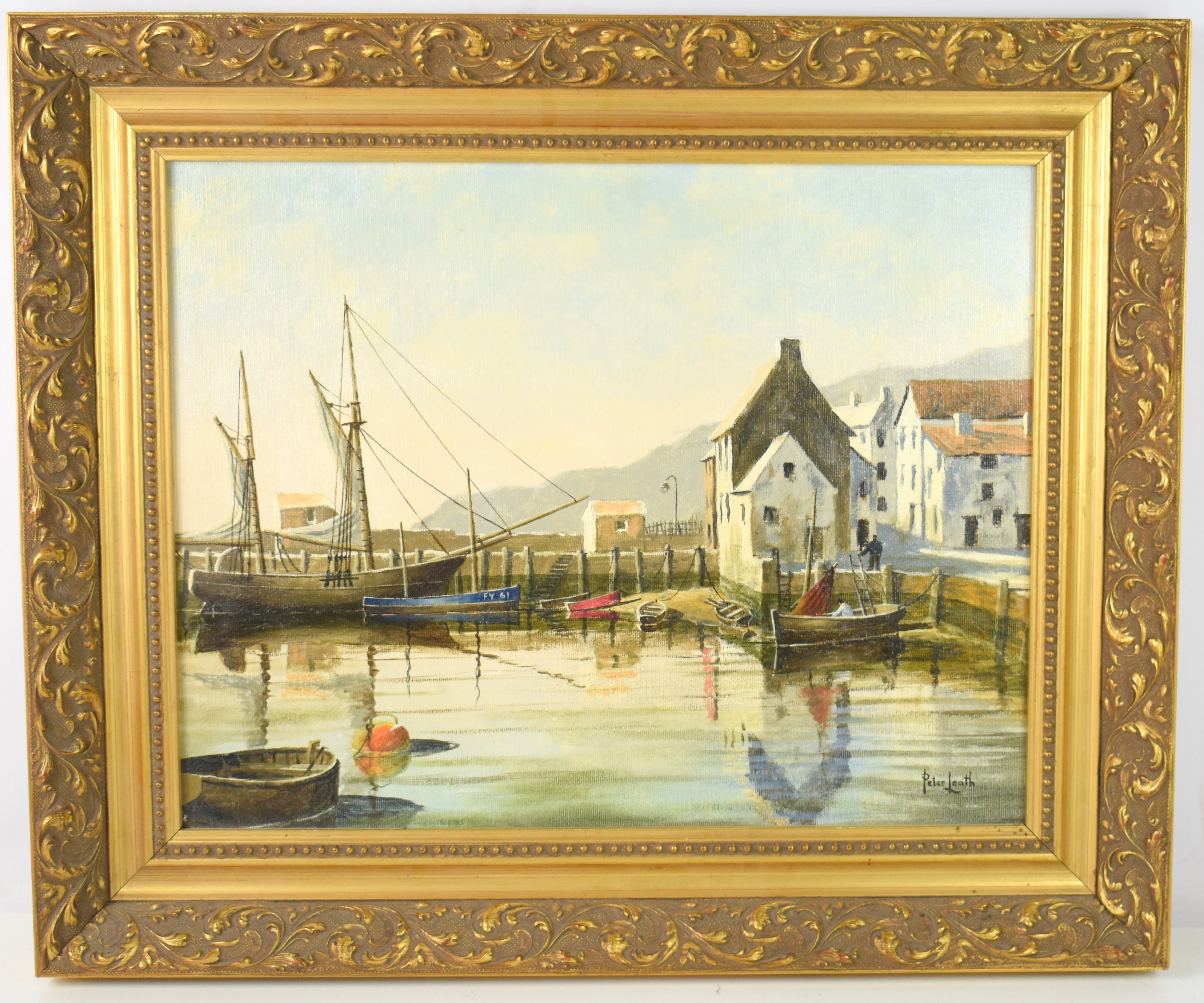 A serene harbor scene featuring boats, buildings, and calm water reflections.