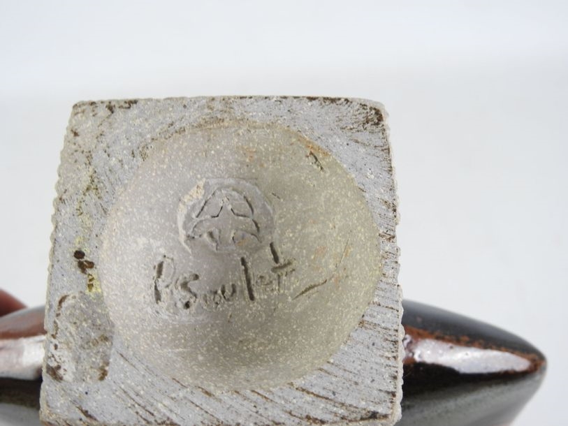 Artwork by Pierrette Soulet, Vase on pedestal with flattened body in orange glazed ceramic, Made of orange glazed ceramic