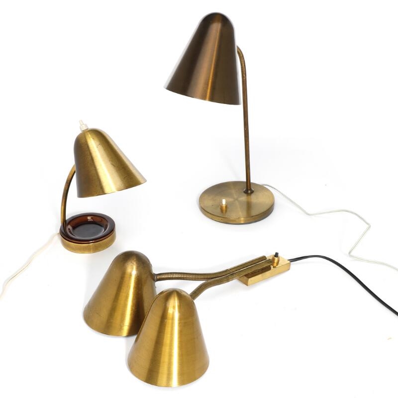 Jacques Biny | Set of three lamps of brass, consisting of wall lamp and ...