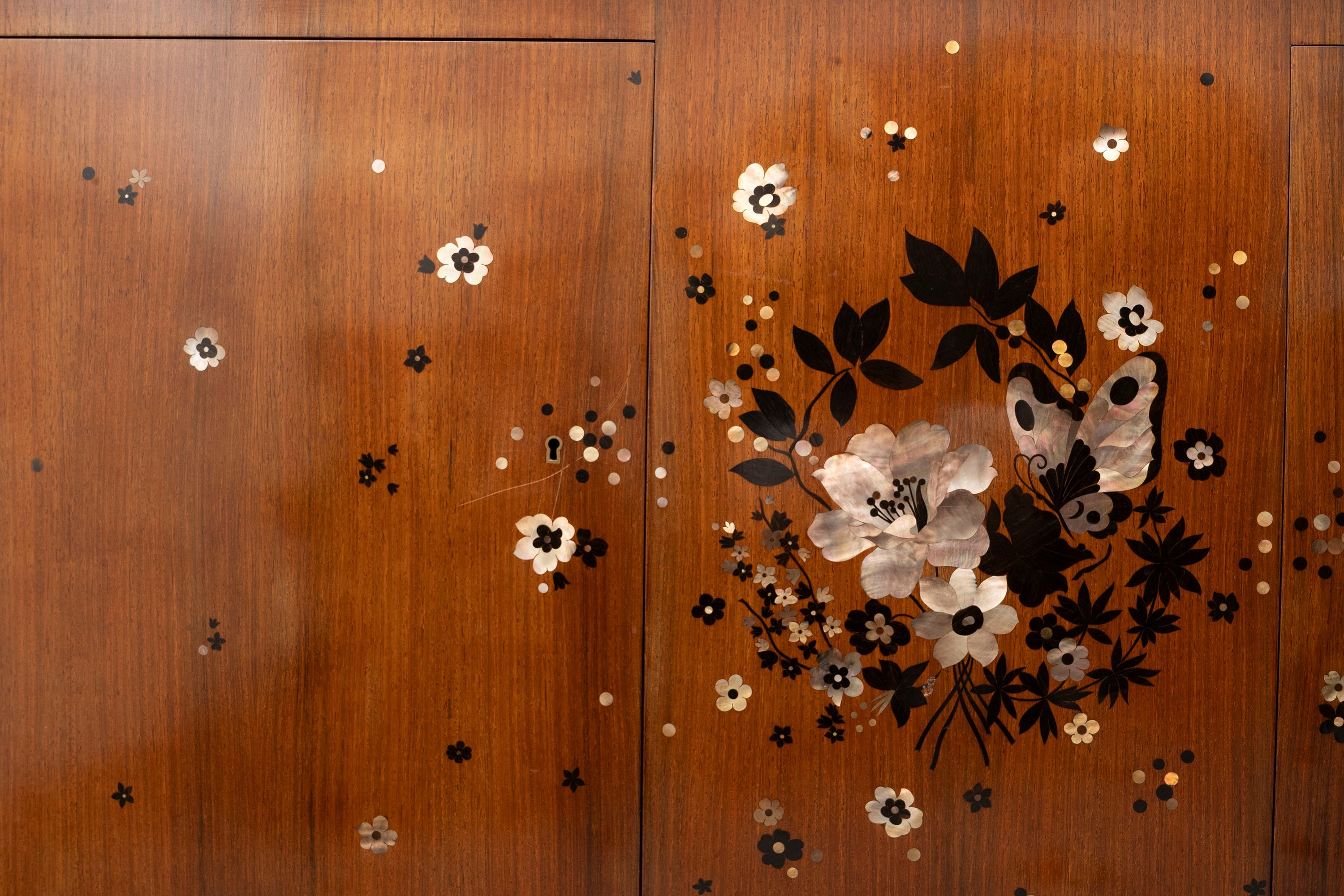 Artwork by Jules Leleu, Important and rare pair of commodes inlaid with mother of pearl and various woods, Made of gilt bronze