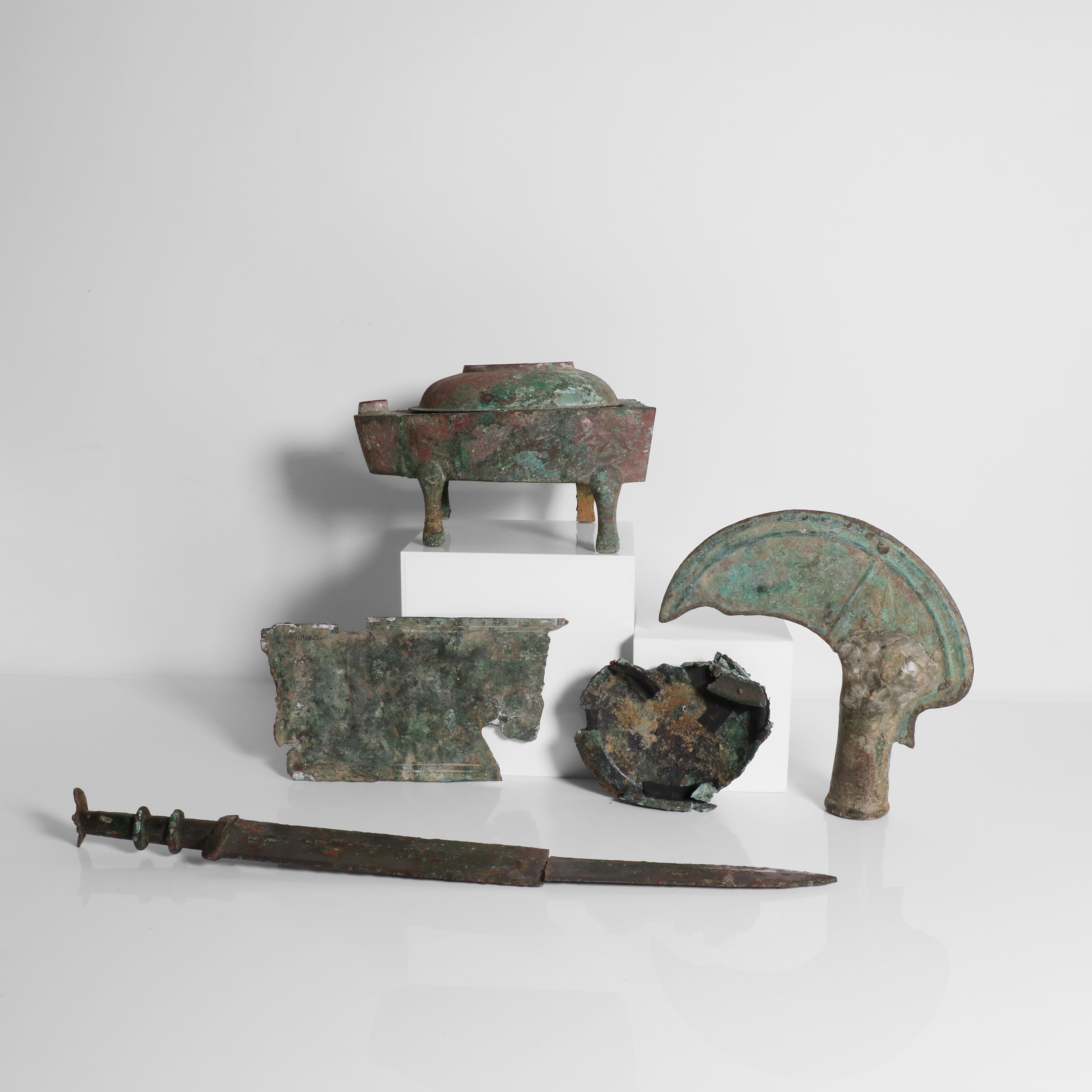 Han Dynasty | comprising: a bronze sword possibly Warring States period ...