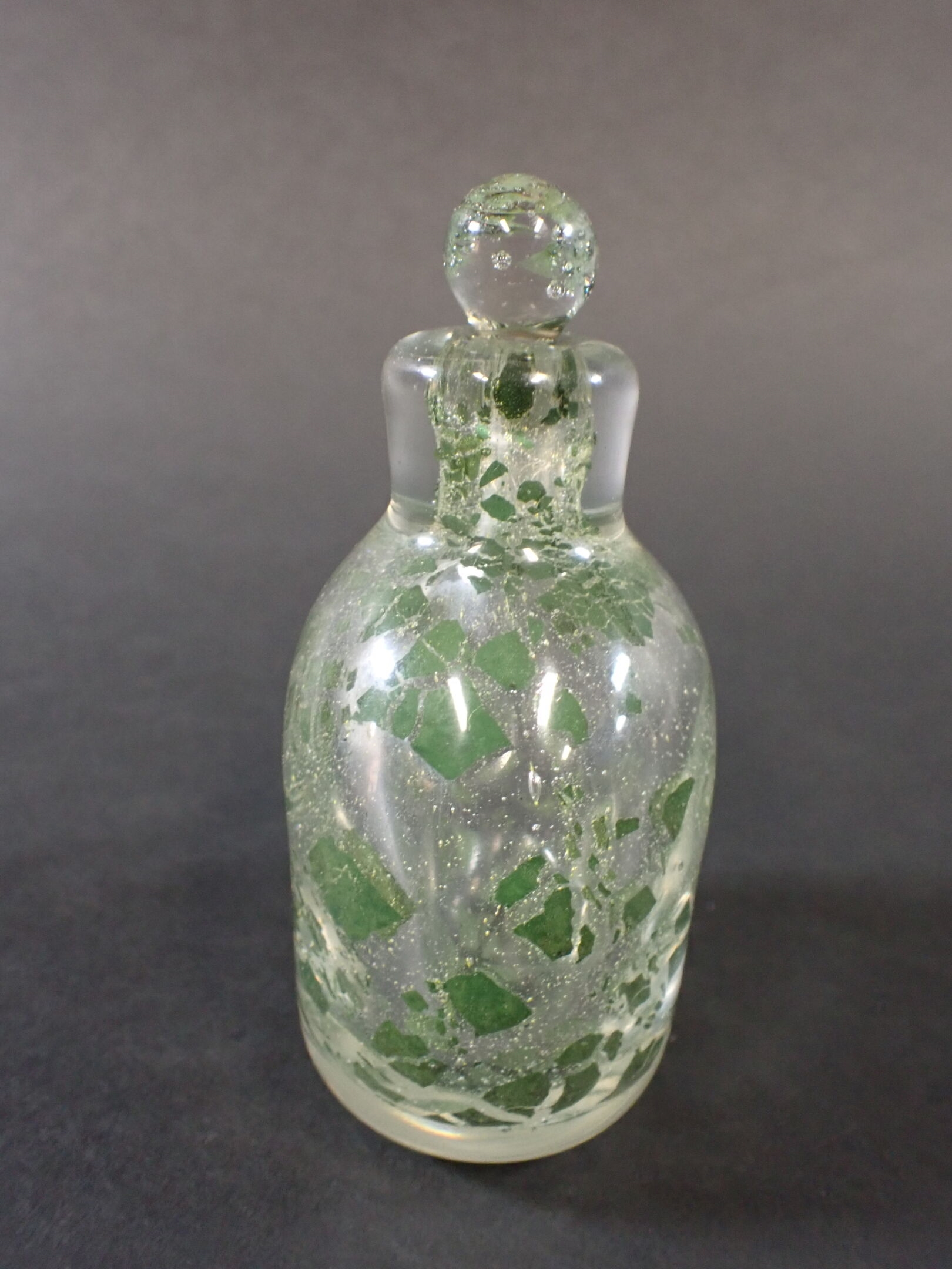 Artwork by Maurice Marinot, Petit flacon à craquelé très éclaté, Made of thick blown and hot-shaped glass, translucent orange, with inclusions of metal oxides