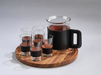 A Martini mixer and six cups with tray