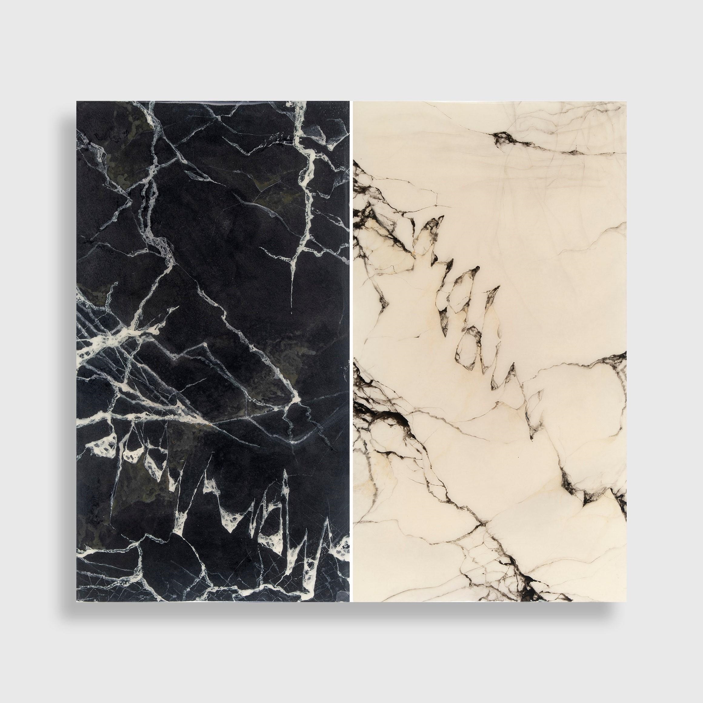 A minimalist diptych featuring contrasting black and white marble textures.
