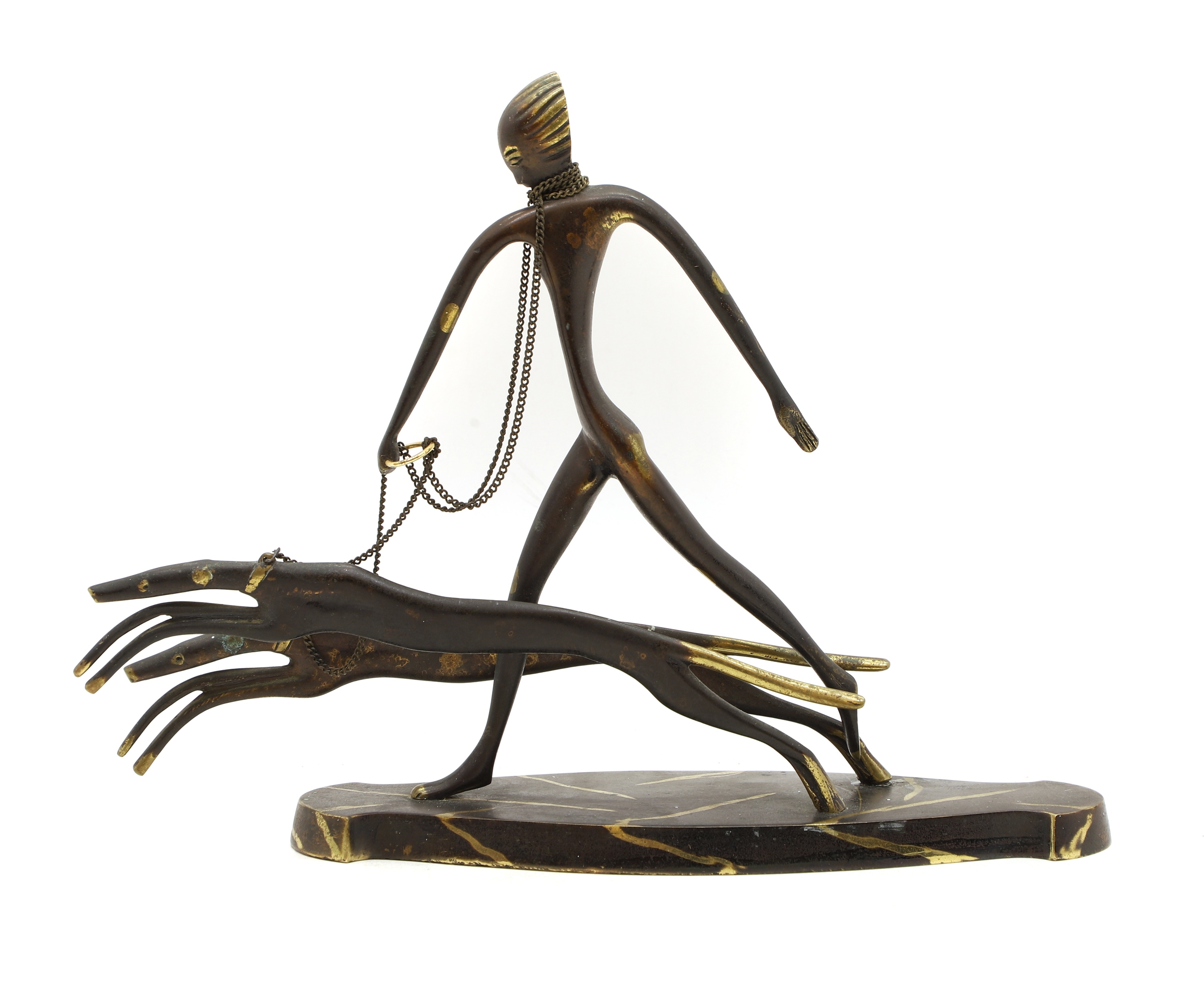 Artwork by Franz Hagenauer, 20th century in the manner of Franz Hagenauer the standing figure holding two greyhounds by chains on a shaped base
