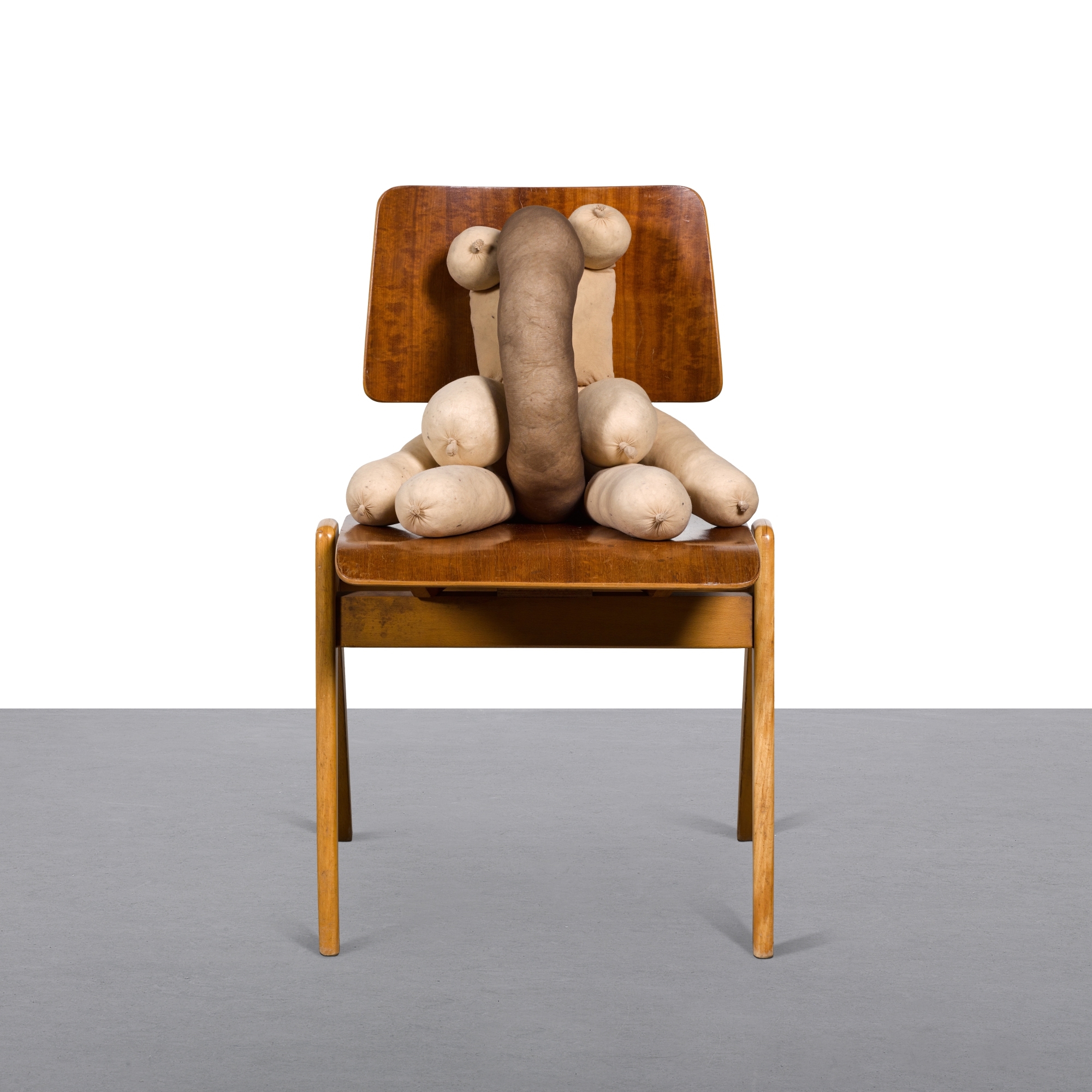 Artwork by Sarah Lucas, Tit Teddy Ugo, Made of tights, kapok and wooden chair