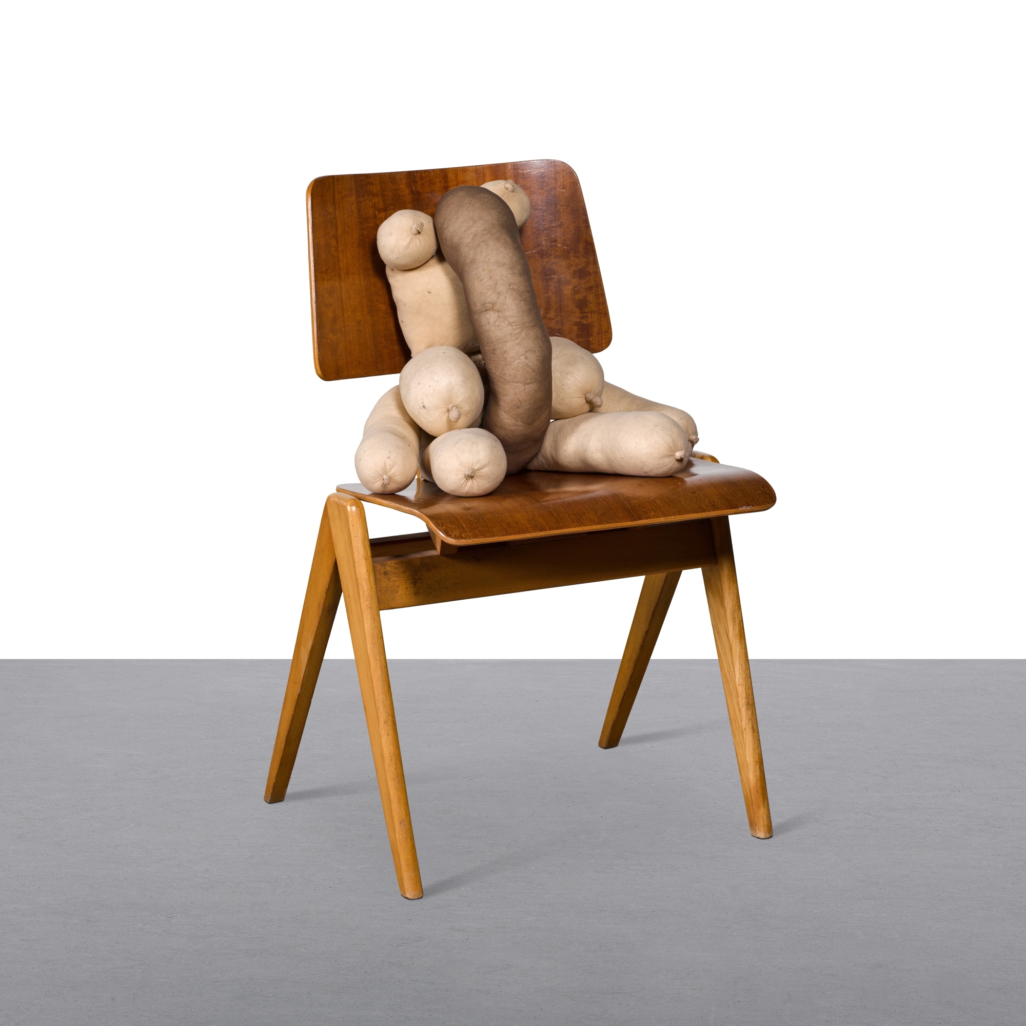 Artwork by Sarah Lucas, Tit Teddy Ugo, Made of tights, kapok and wooden chair