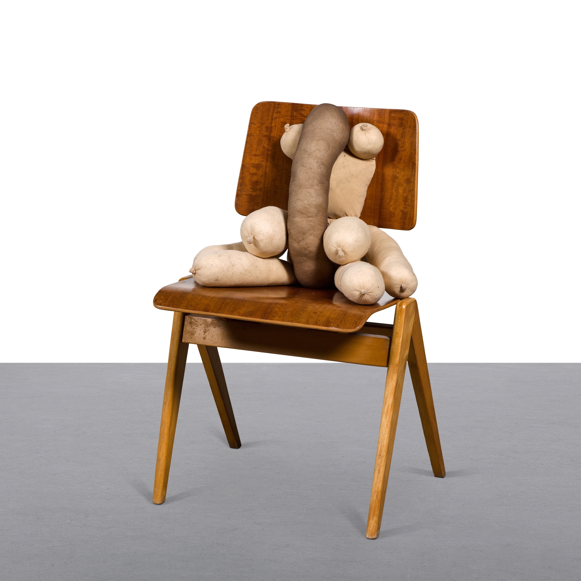 Artwork by Sarah Lucas, Tit Teddy Ugo, Made of tights, kapok and wooden chair