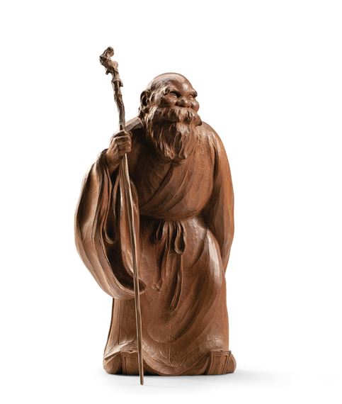 Nankai Ota | A CARVED CHERRY WOOD FIGURE OF PENG ZU | MutualArt