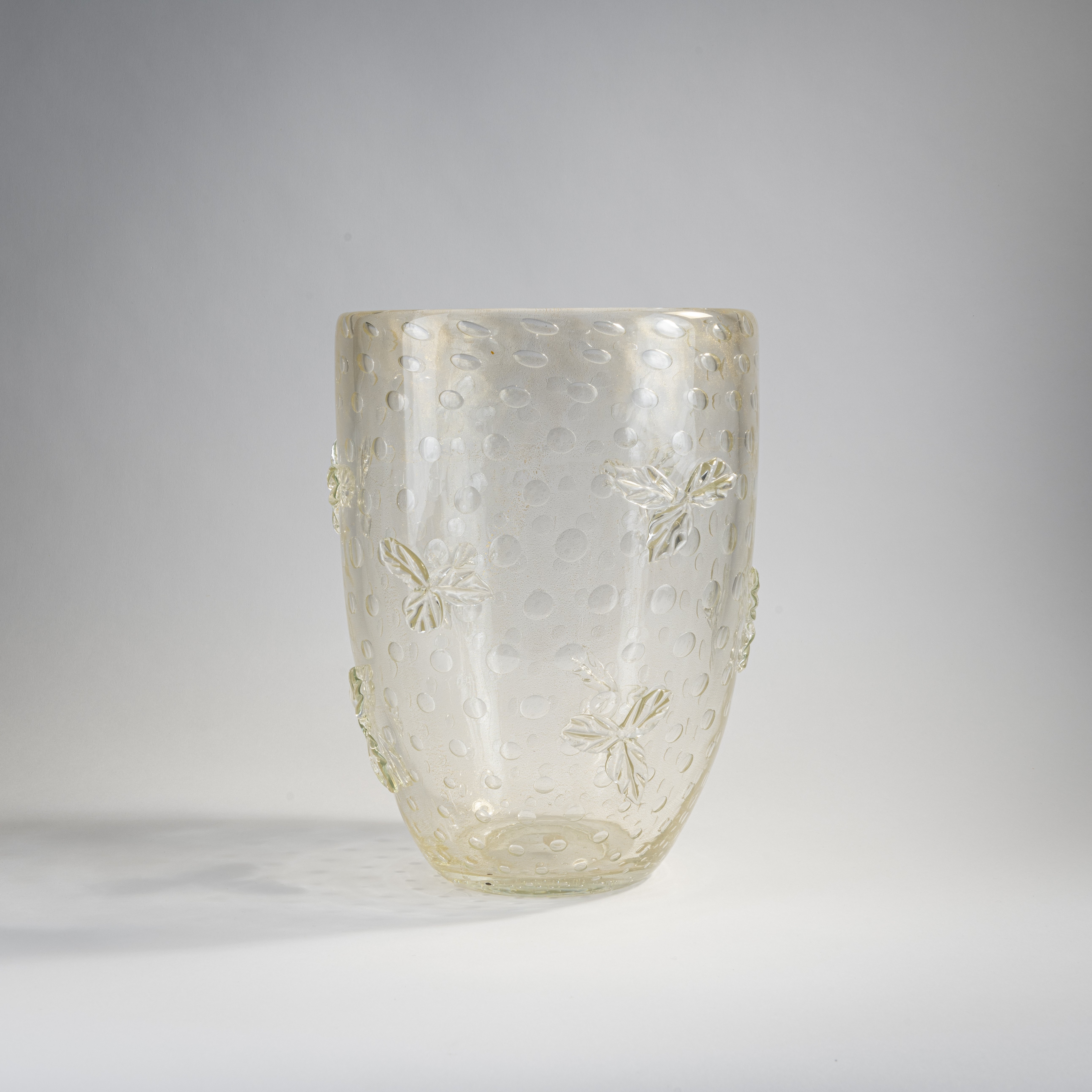 Vase with applied leaves