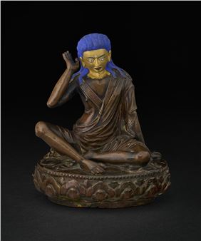 A BRONZE FIGURE OF MILAREPA - Bhutanese School, 18th Century