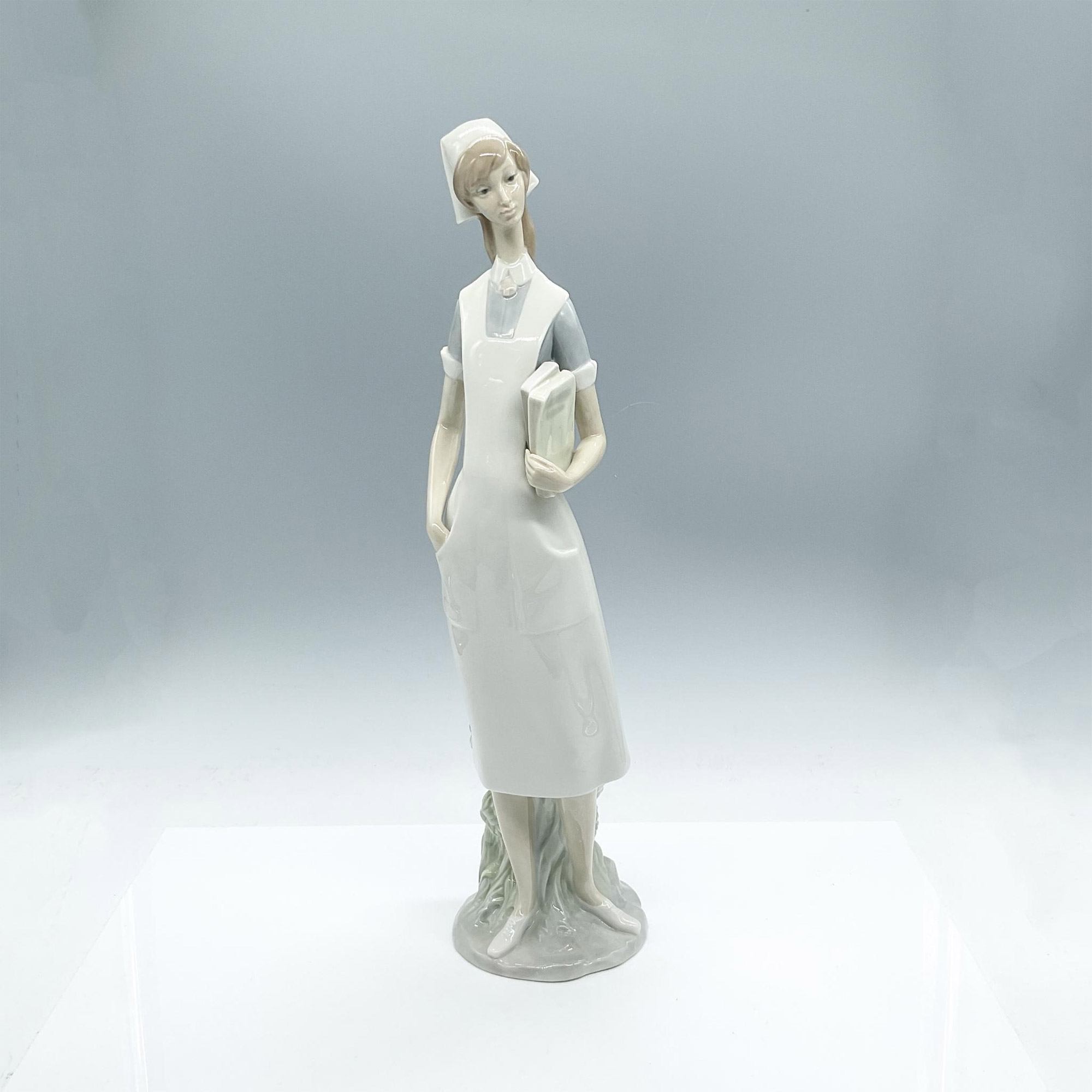 Salvador Furio Lladro Porcelain Figurine, Nurse 1004603 MutualArt