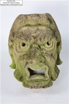 A carved bathstone fountain mask probably by Andrew Swinley - Andrew Swinley