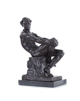 "A bronze sculpture of a seated nude figure resting on a tree stump."
