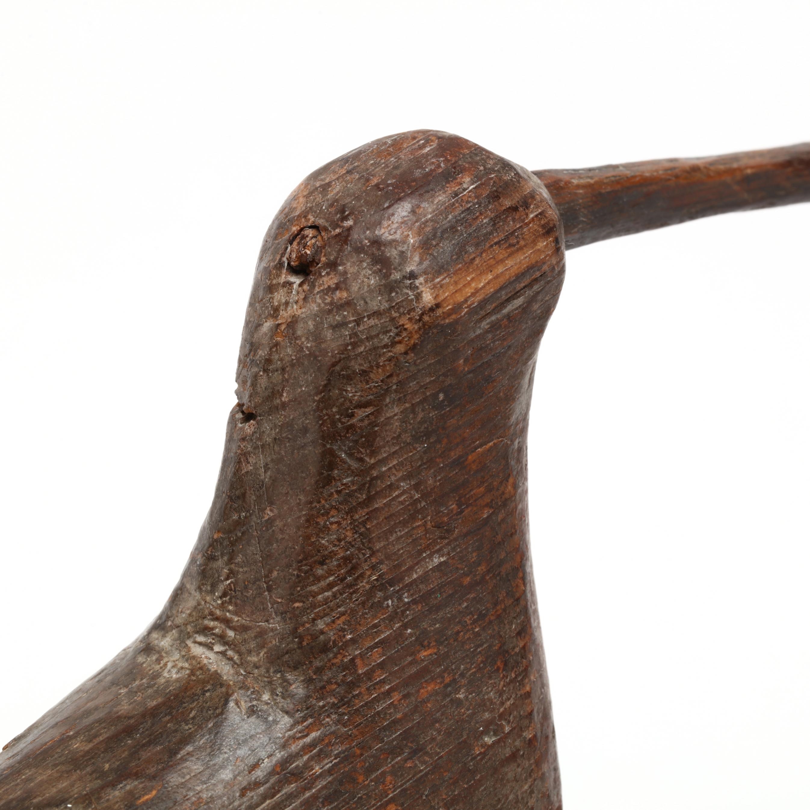 Artwork by Mitchell Fulcher, Important Robin Snipe, Made of carved and painted wood