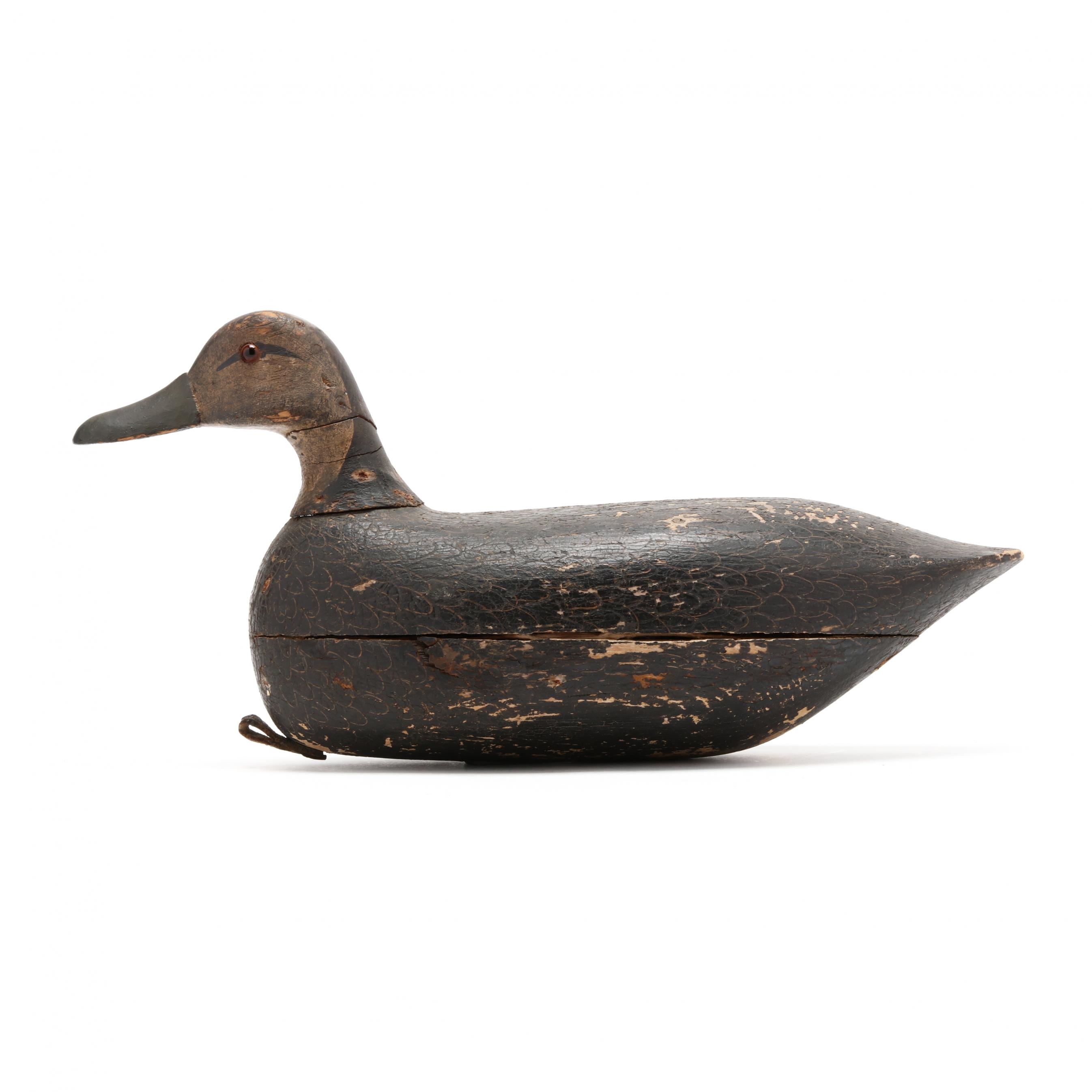 Artwork by Samuel Soper, Black Duck, Made of carved and painted wood, glass
