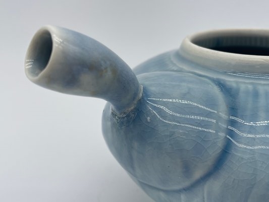 Artwork by Gerit Grimm, Gerit Grimm Surreal Teapot, Made of pale blue glazed