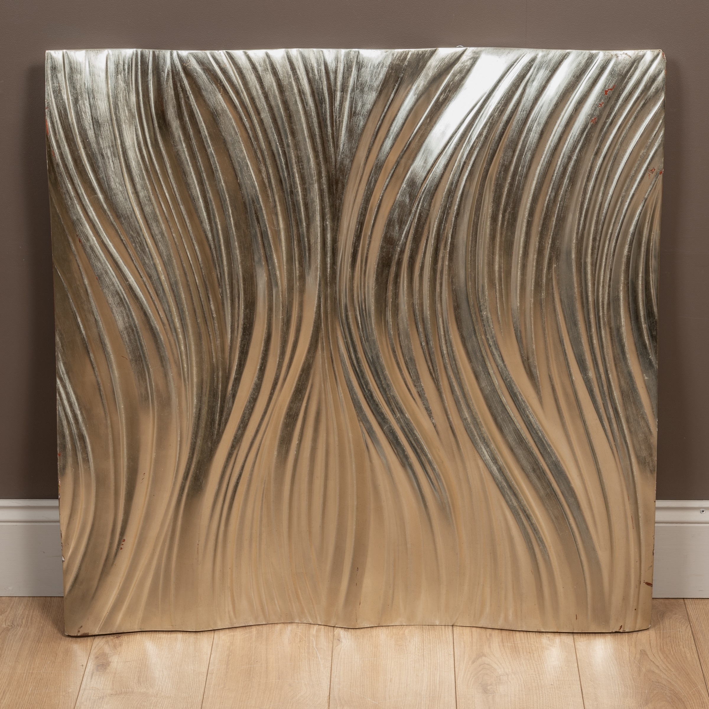 Artwork by Simon Allen, Waves, Made of Carved wood with white metal gilding