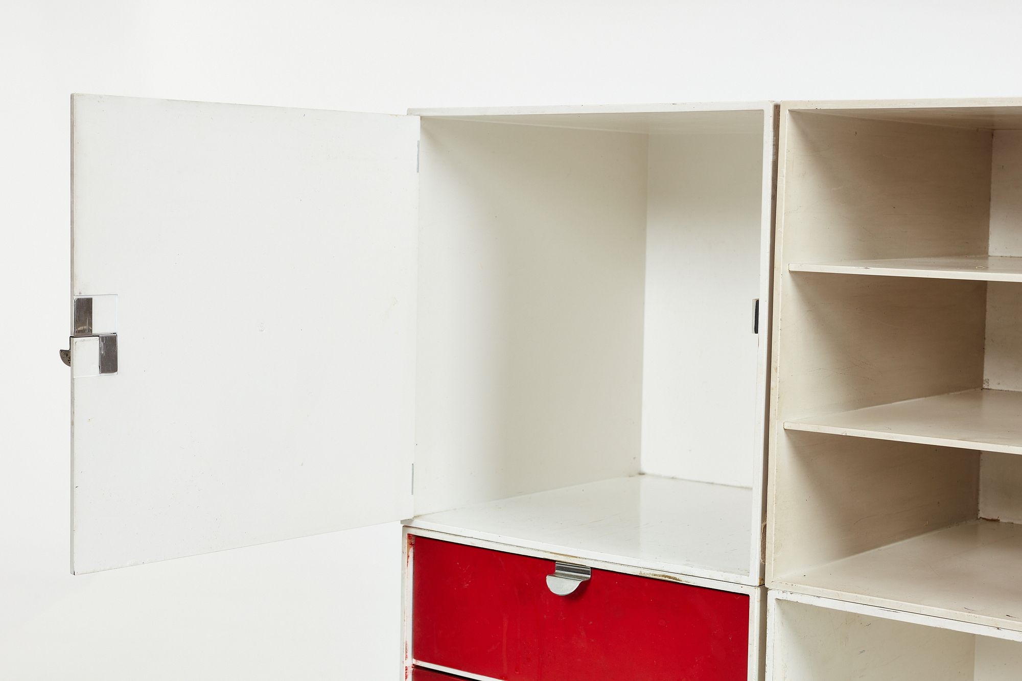 Artwork by Ristomatti Ratia, Set of nine modular 'Palaset' storage cubes, Made of Painted plastic, chrome-plated metal