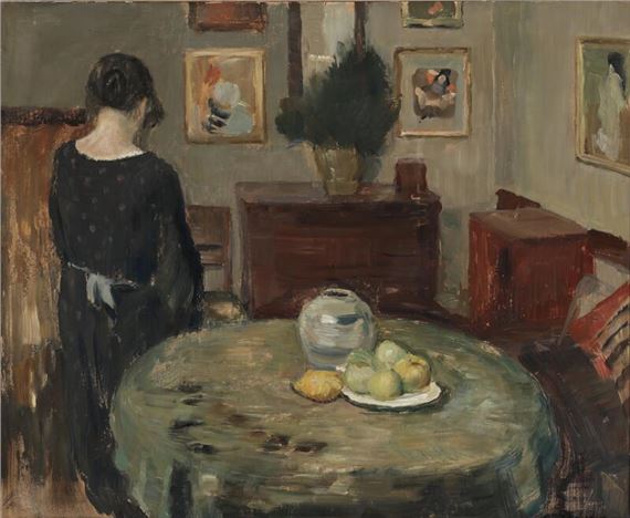 Interior with a woman with her back turned