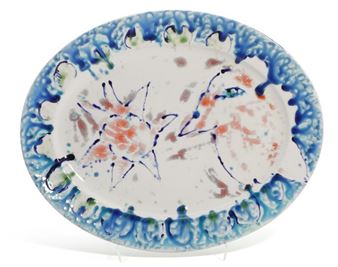 Dish of Royal Copenhagen porcelain decorated with a star and a bird - Carl-Henning Pedersen