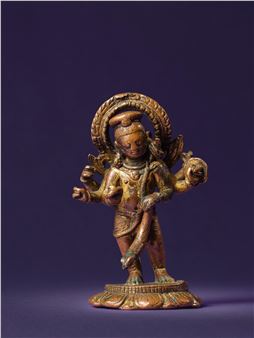 A GILT COPPER ALLOY FIGURE OF A DANDAPURUSHA - Nepalese School, 9th Century