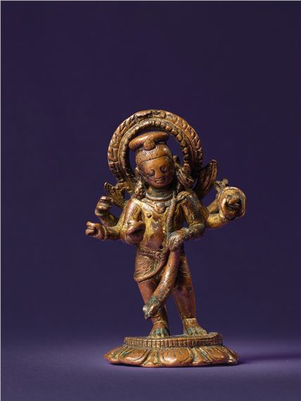 A GILT COPPER ALLOY FIGURE OF A DANDAPURUSHA - Nepalese School, 9th Century
