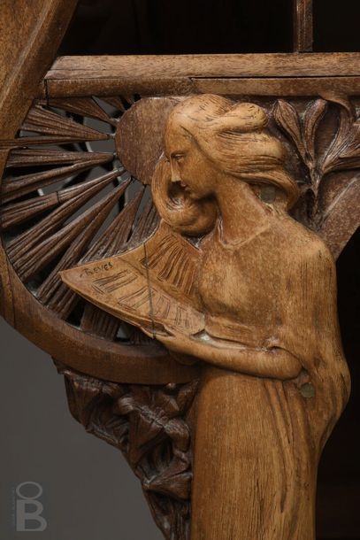 Artwork by René Defland, Score cabinet in  of two young women, Made of carved and molded cherry wood with orange wood decoration