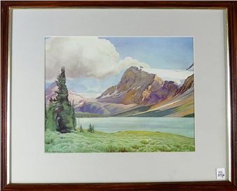 A framed watercolor landscape of a serene mountain lake with a lone pine tree.