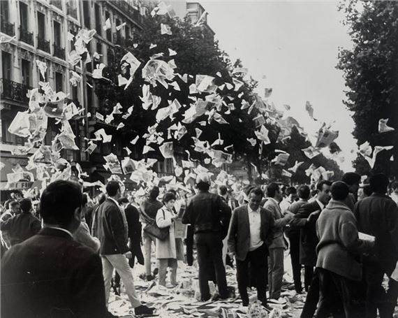 Newspapers in the air after the call for a general strike by Michel Cabaud, 1968