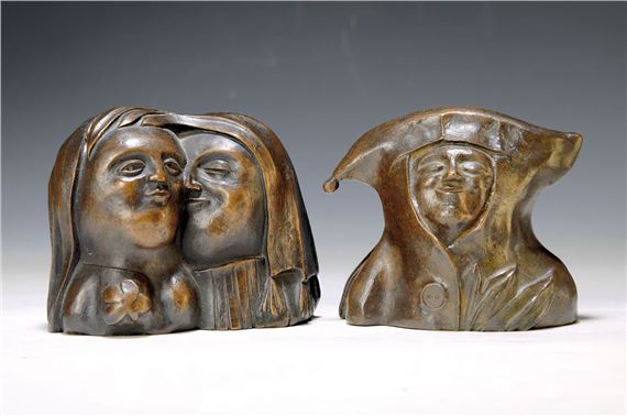 2 bronzesculptures: Eulenspiegel head,with second face on the back