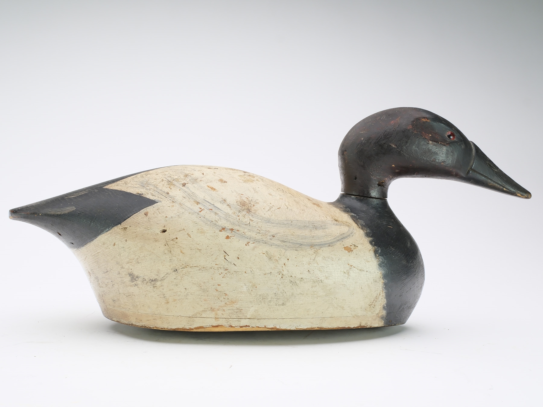 Artwork by August Moak, Canvasback, Made of Hollow carved canvasback with chamfered bottom board