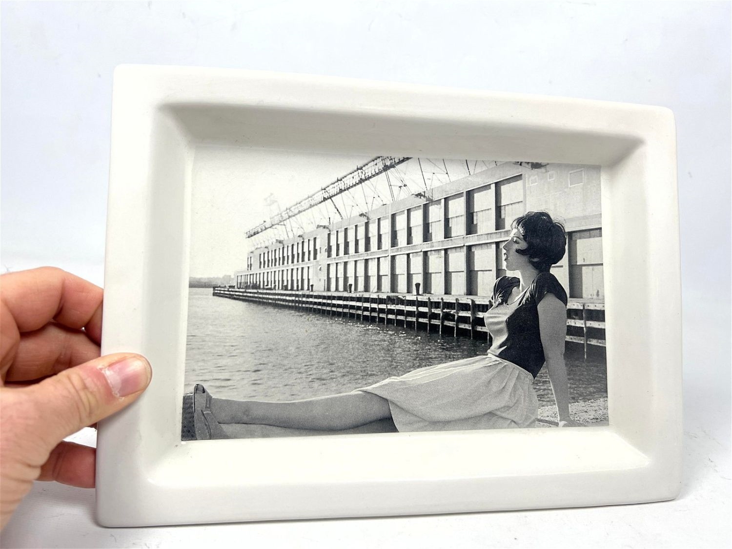Cindy Sherman | Photo of young woman on dock (2014) | MutualArt