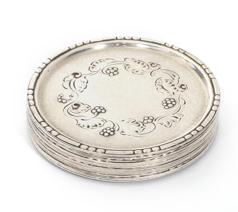 Jensen Set of 12 sterling silver glass coasters with hammered