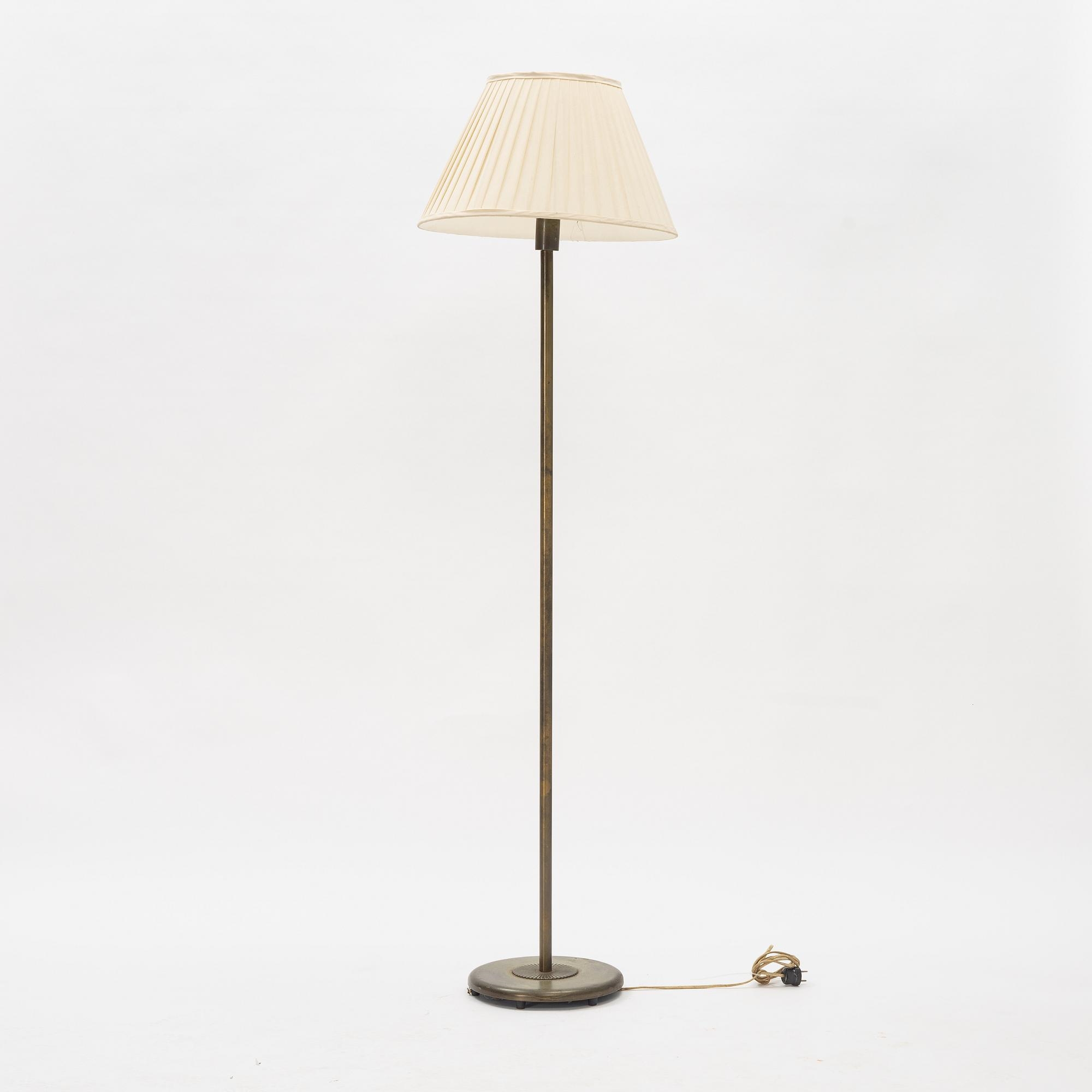Artwork by Harald Notini, a model 15370 floor lamp, Arvid Böhlmarks Lampfabrik, 1940's, Made of glass, wood and leather