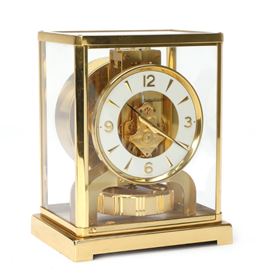 Jaeger-LeCoultre | A brass and glass mantle clock, visible movement ...