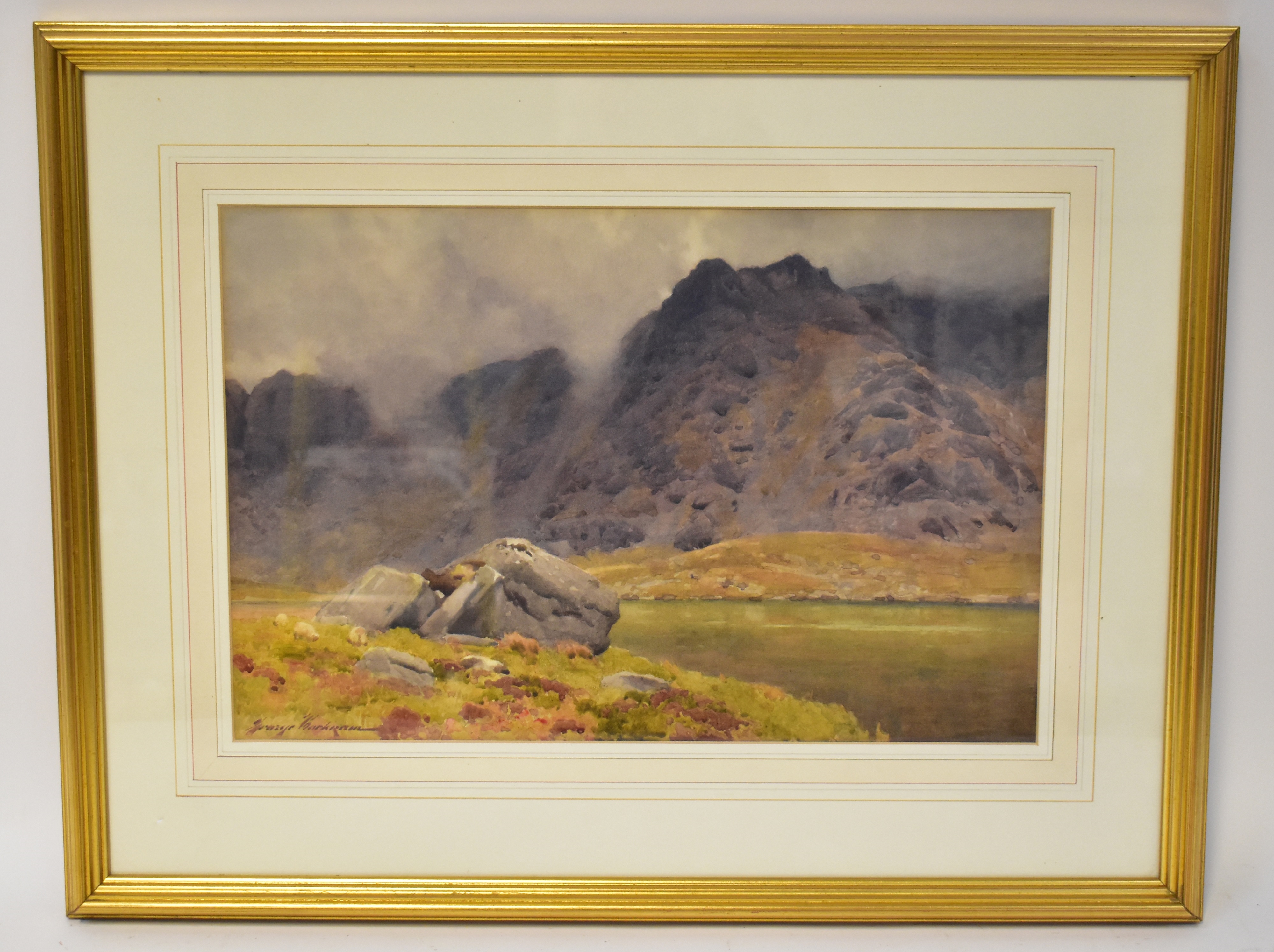 George Cockram | a Welsh mountainous scene with rocks in the foreground ...