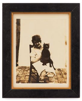 Storyville Resident with Pet Dog", 1960s - Ernest J. Bellocq