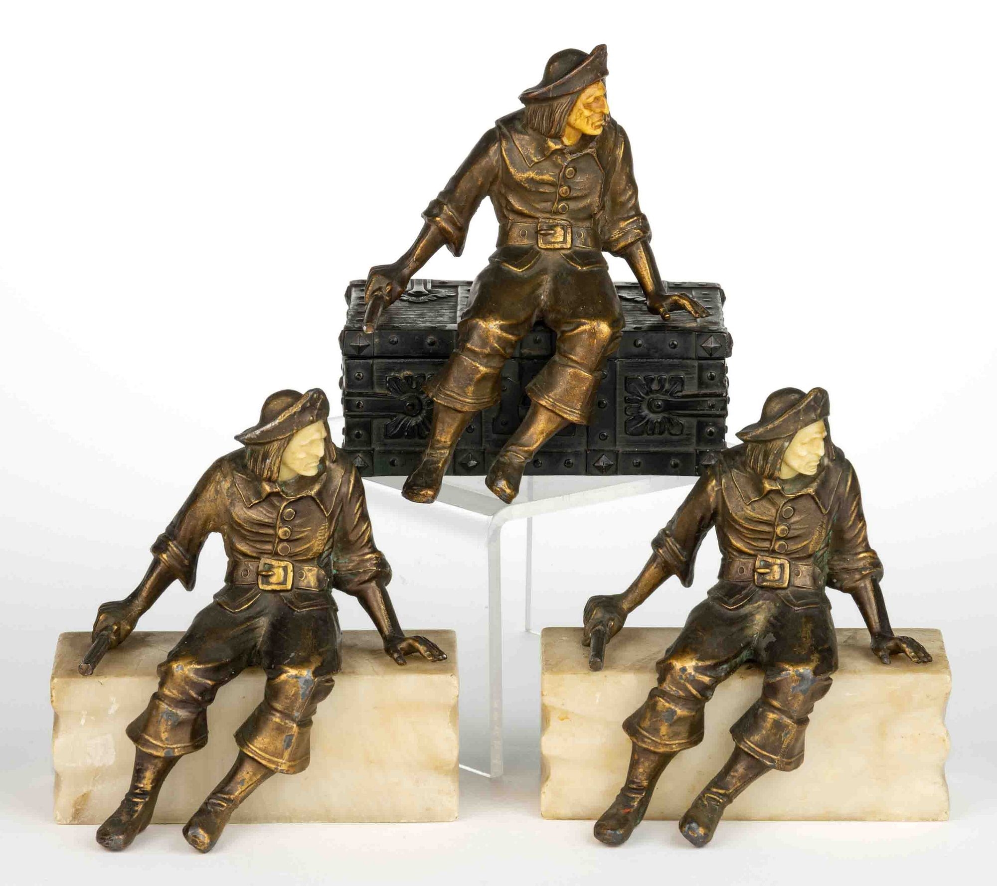 Artwork by J.B. Hirsch, PIRATE BOOKENDS AND COVERED, Made of bronze-patinated metal, mounted to marble or alabaster bases and a hinged treasure chest box which opens to reveal a wooden-lined interior