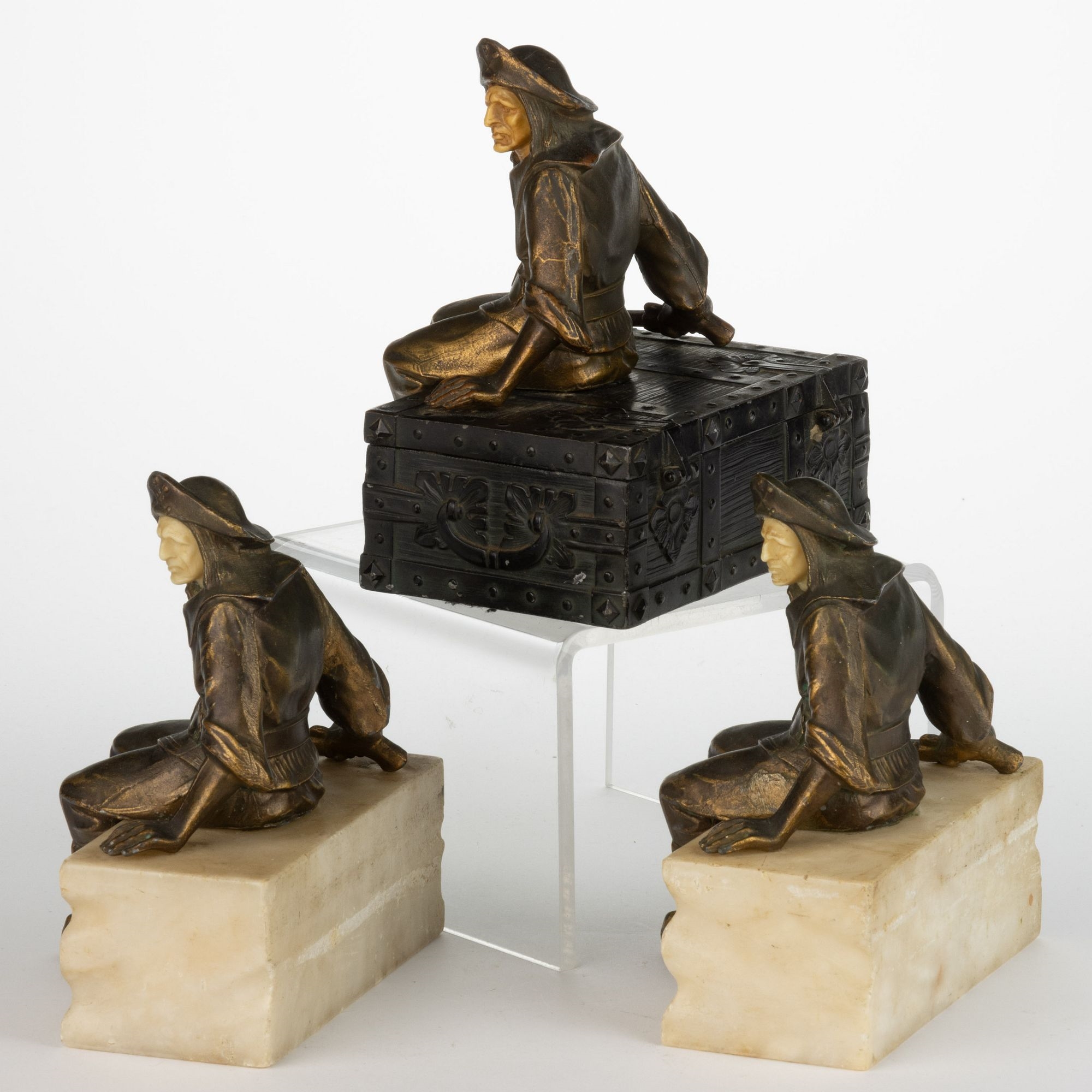 Artwork by J.B. Hirsch, PIRATE BOOKENDS AND COVERED, Made of bronze-patinated metal, mounted to marble or alabaster bases and a hinged treasure chest box which opens to reveal a wooden-lined interior