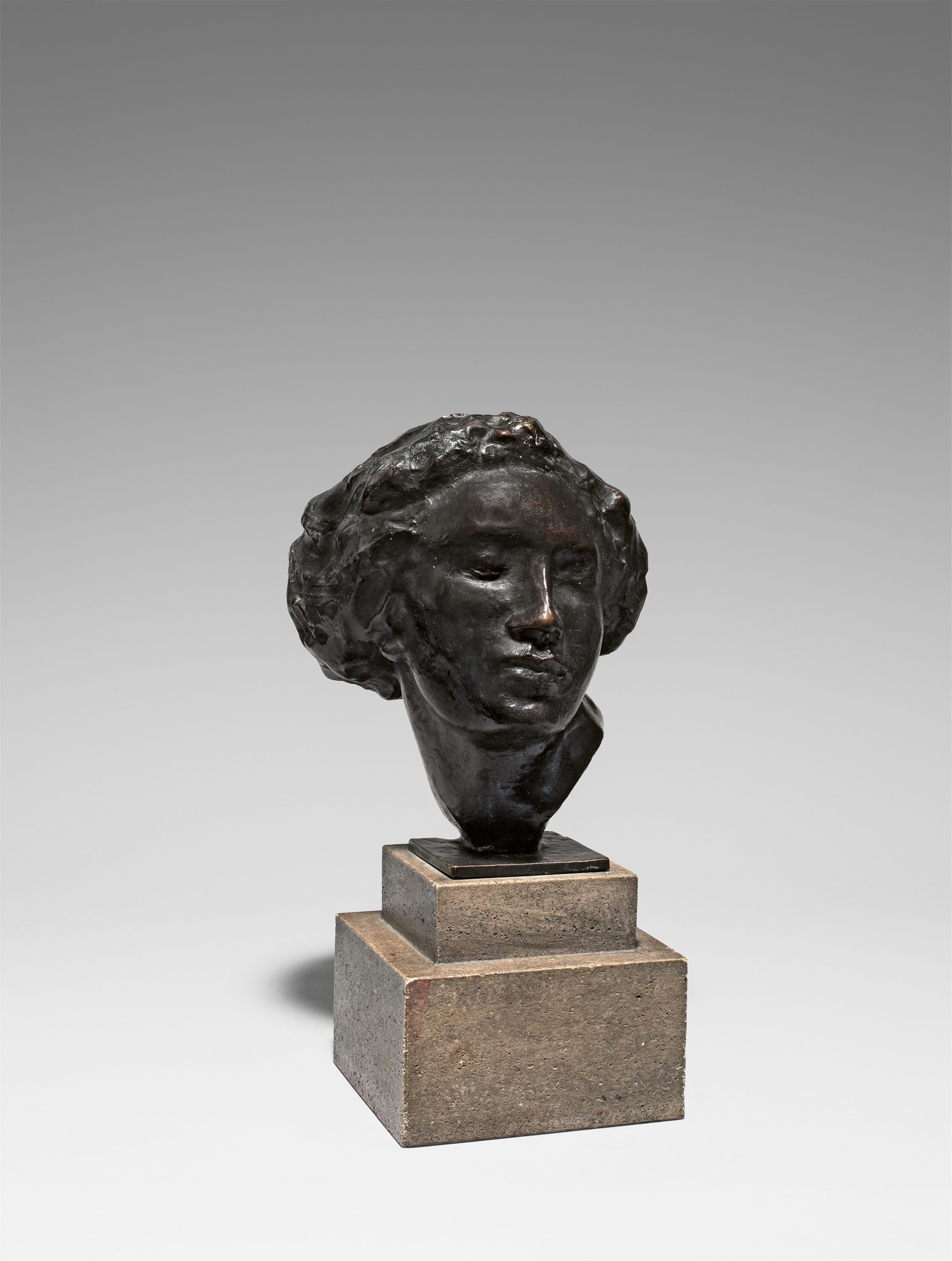 Artwork by Georg Kolbe, Kopf der Tänzerin, Made of Bronze with black-brown patina, mounted on stone base