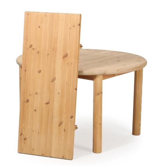 Rainer Daumiller | Circular dining table of solid pine with extension ...