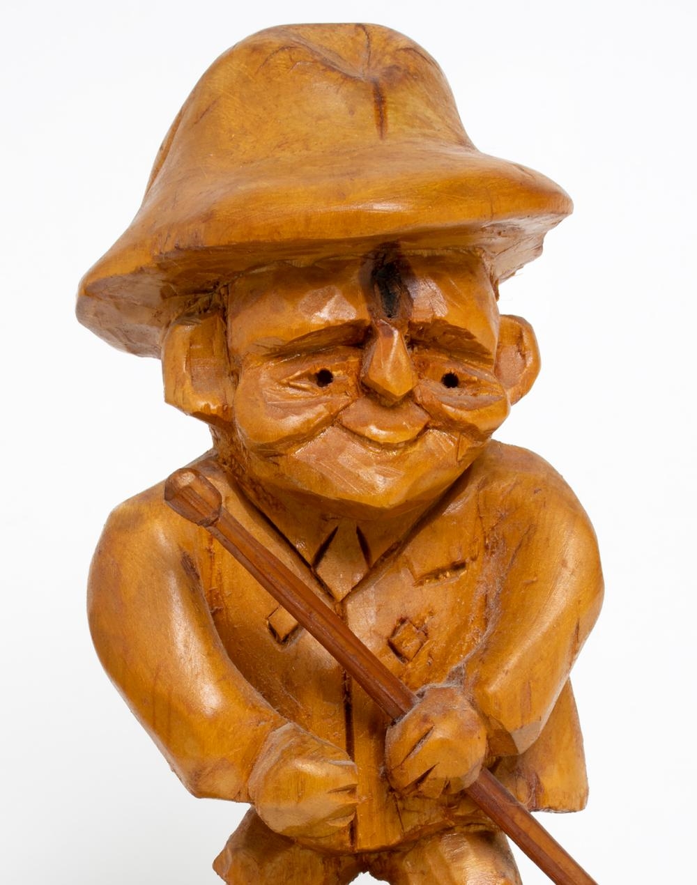 Artwork by John Moyles, Man with Walking Stick, Made of Carved wooden sculpture