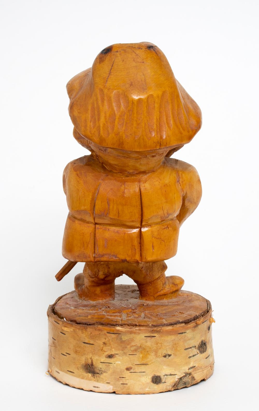 Artwork by John Moyles, Man with Walking Stick, Made of Carved wooden sculpture