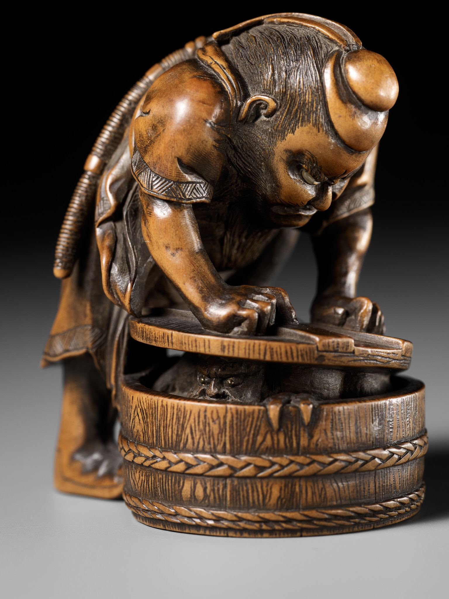 Artwork by Hokyudo Itsumin, HOKYUDO ITSUMIN: A FINE NETSUKE-OKIMONO OF SHOKI AND ONI, Made of translucent horn