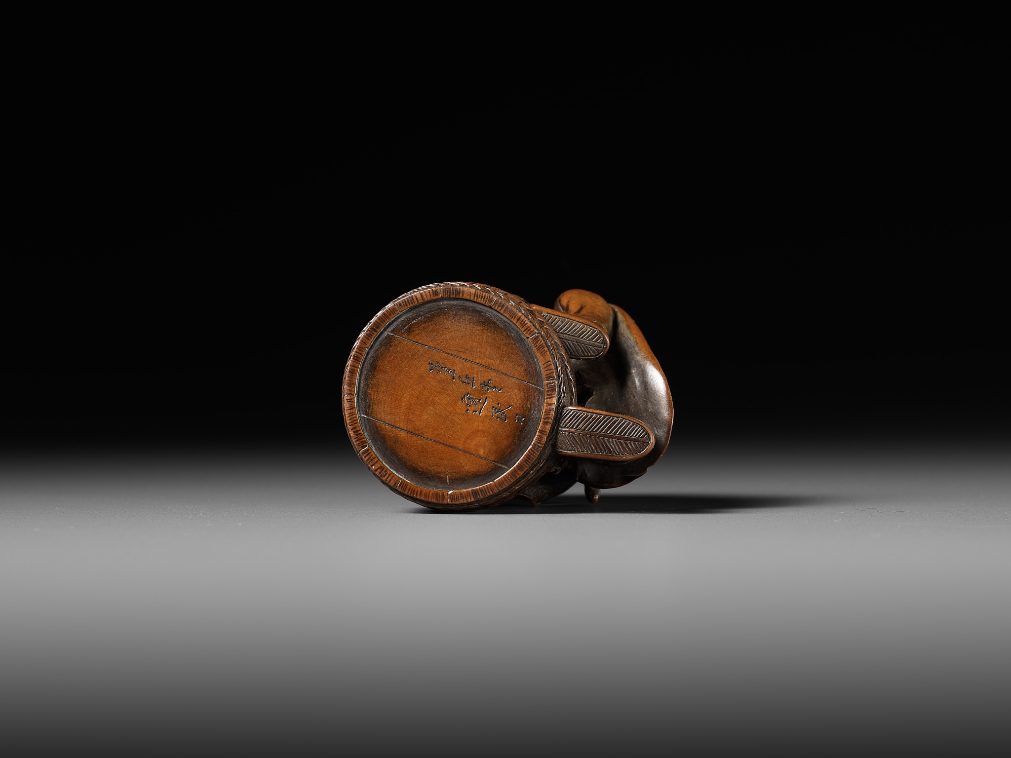 Artwork by Hokyudo Itsumin, HOKYUDO ITSUMIN: A FINE NETSUKE-OKIMONO OF SHOKI AND ONI, Made of translucent horn