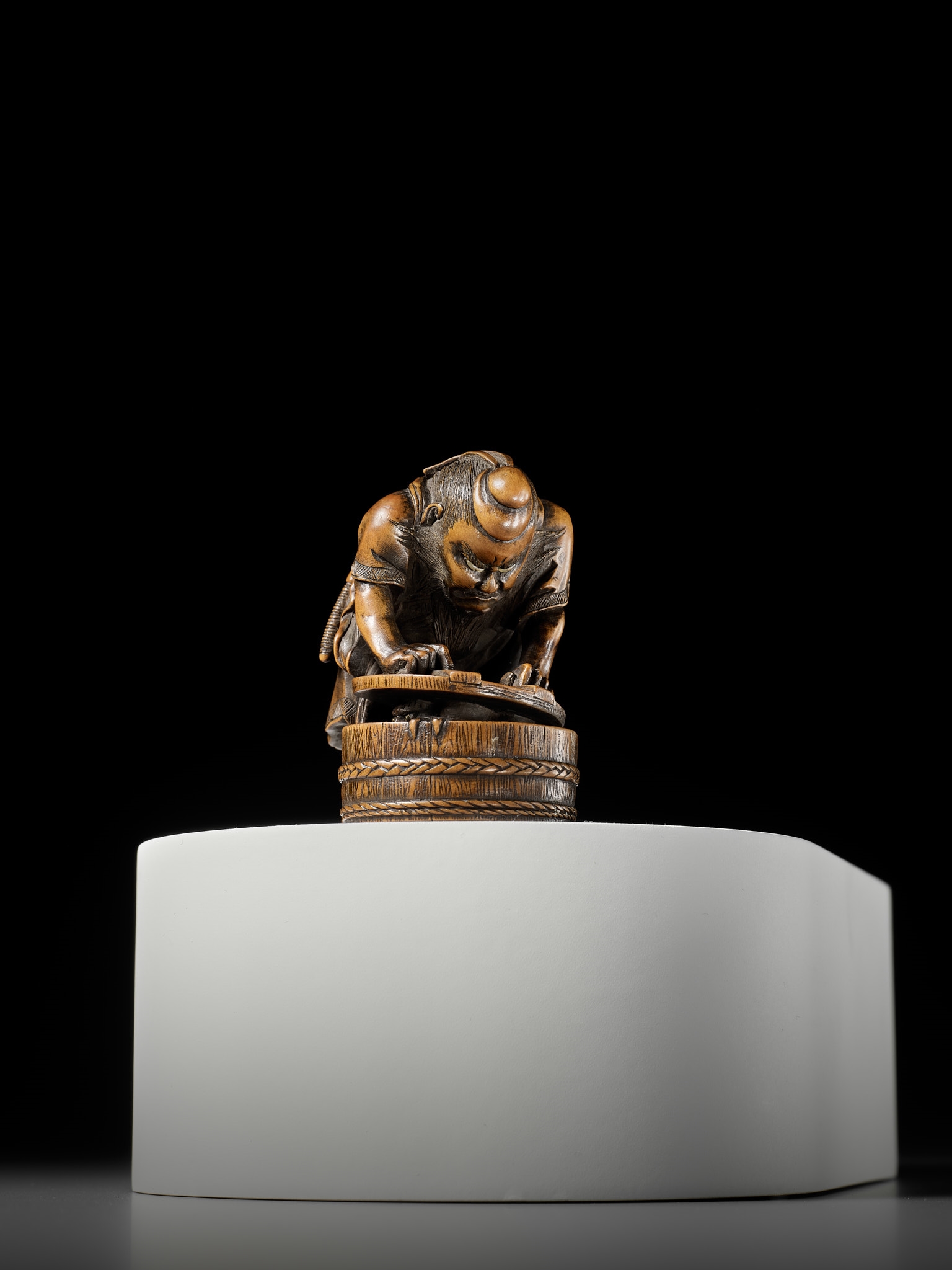 Artwork by Hokyudo Itsumin, HOKYUDO ITSUMIN: A FINE NETSUKE-OKIMONO OF SHOKI AND ONI, Made of translucent horn