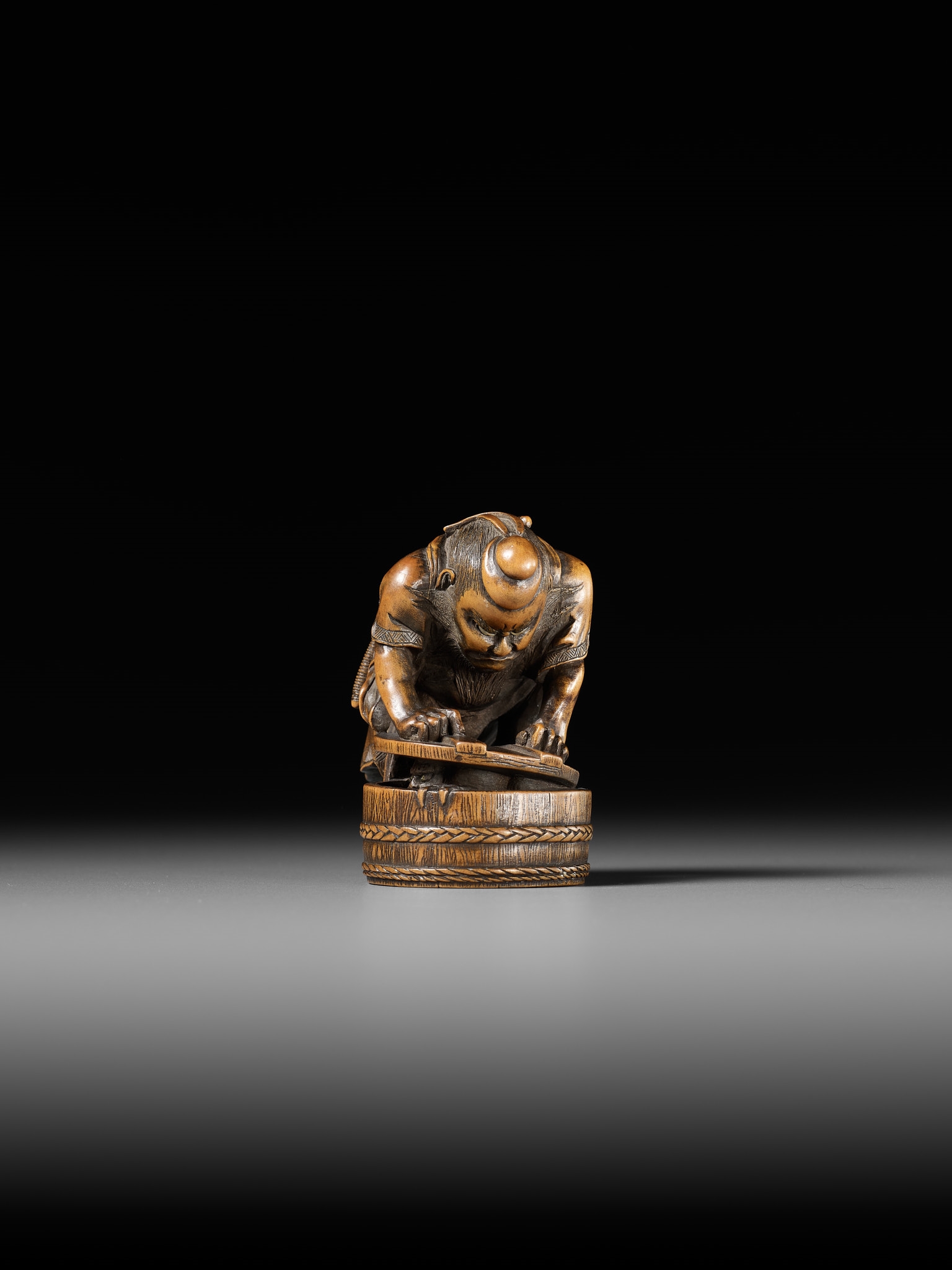 Artwork by Hokyudo Itsumin, HOKYUDO ITSUMIN: A FINE NETSUKE-OKIMONO OF SHOKI AND ONI, Made of translucent horn